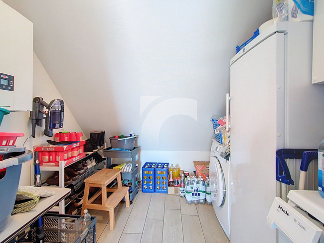 Immobilienmakler Kelmis DG-Wohnung kaufen mit Immobilienbewertung