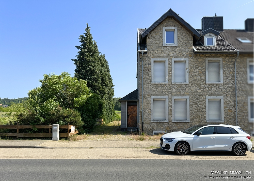 Doppelhaushälfte Stolberg (Rheinland) / Mausbach kaufen Phi: Ansicht Front Immobilienmakler Stolberg (Rheinland) / Mausbach Doppelhaushälfte kaufen mit Immobilienbewertung