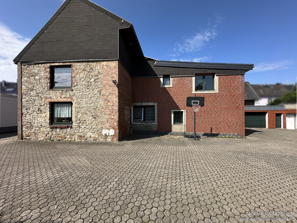 Immobilienmakler Aachen / Brand Mehrfamilienhaus kaufen mit Immobilienbewertung