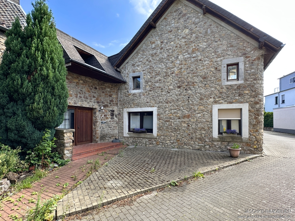 Immobilienmakler Aachen / Brand Mehrfamilienhaus kaufen mit Immobilienbewertung