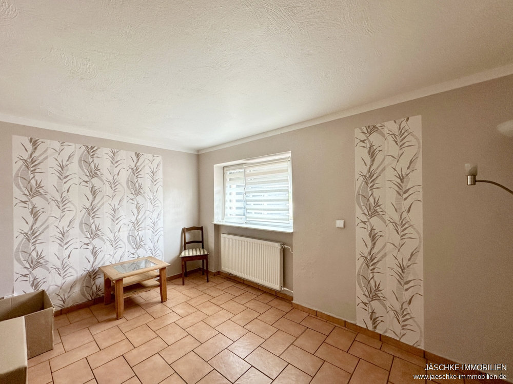 Zweifamilienhaus Stolberg (Rheinland) / Breinig kaufen Phi: Wohnzimmer EG Immobilienmakler Stolberg (Rheinland) / Breinig Zweifamilienhaus kaufen mit Immobilienbewertung