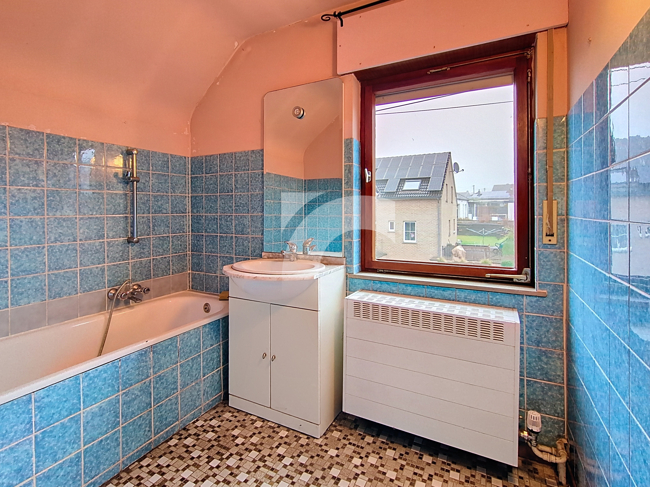 Immobilienmakler KELMIS Einfamilienhaus kaufen mit Immobilienbewertung