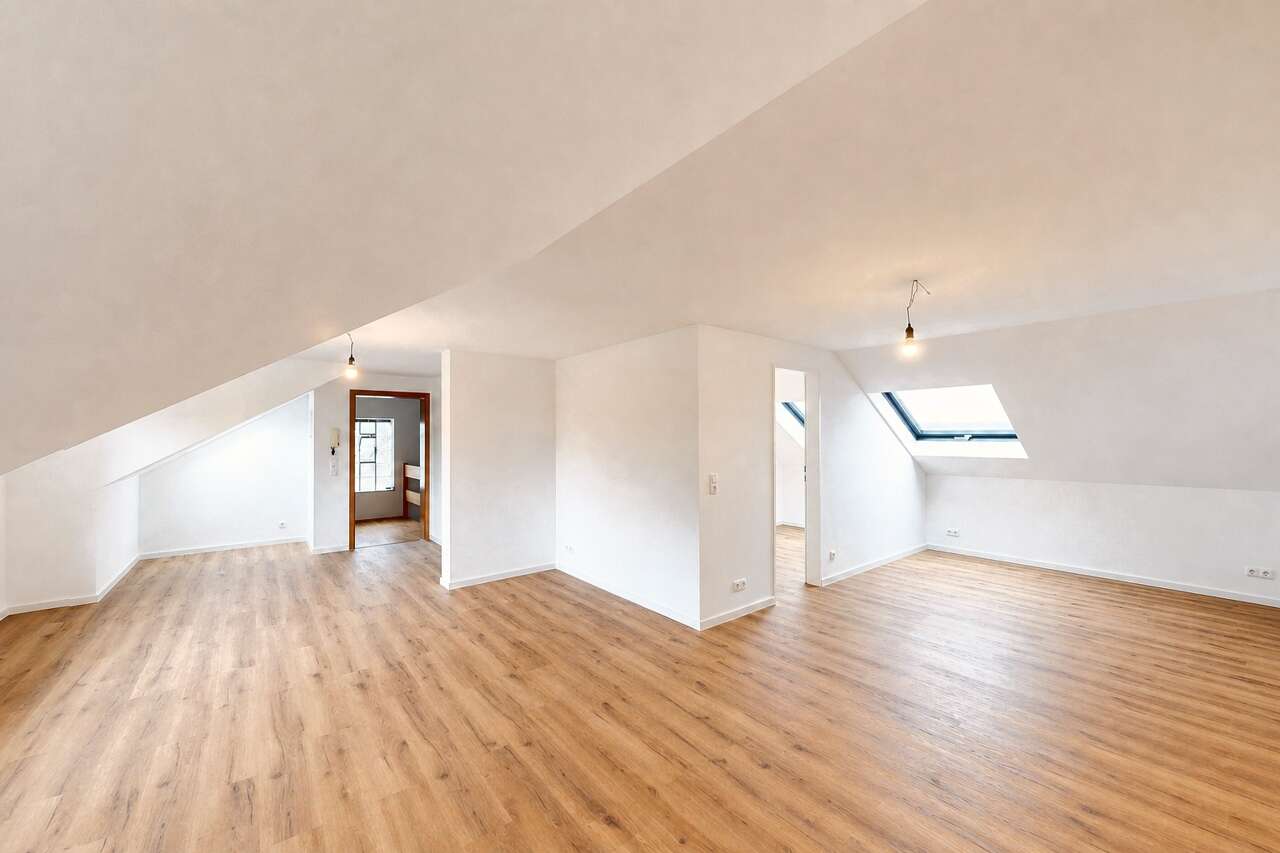 DG-Wohnung Eschweiler mieten Phi: PHI Aachen-Eschweiler-Eigentumswohnung-Miete-M-CI442.DG-Wohnzimmer-01 Immobilienmakler Eschweiler DG-Wohnung mieten mit Immobilienbewertung