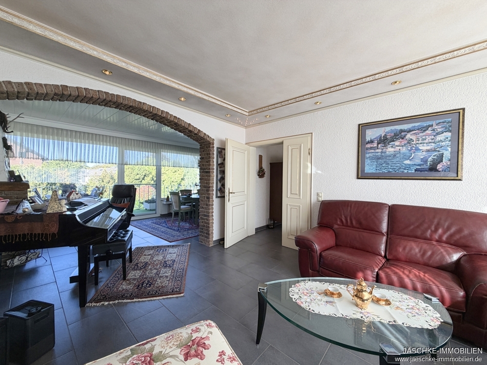 Einfamilienhaus Herzogenrath / Merkstein kaufen Phi: Wohnzimmer Immobilienmakler Herzogenrath / Merkstein Einfamilienhaus kaufen mit Immobilienbewertung